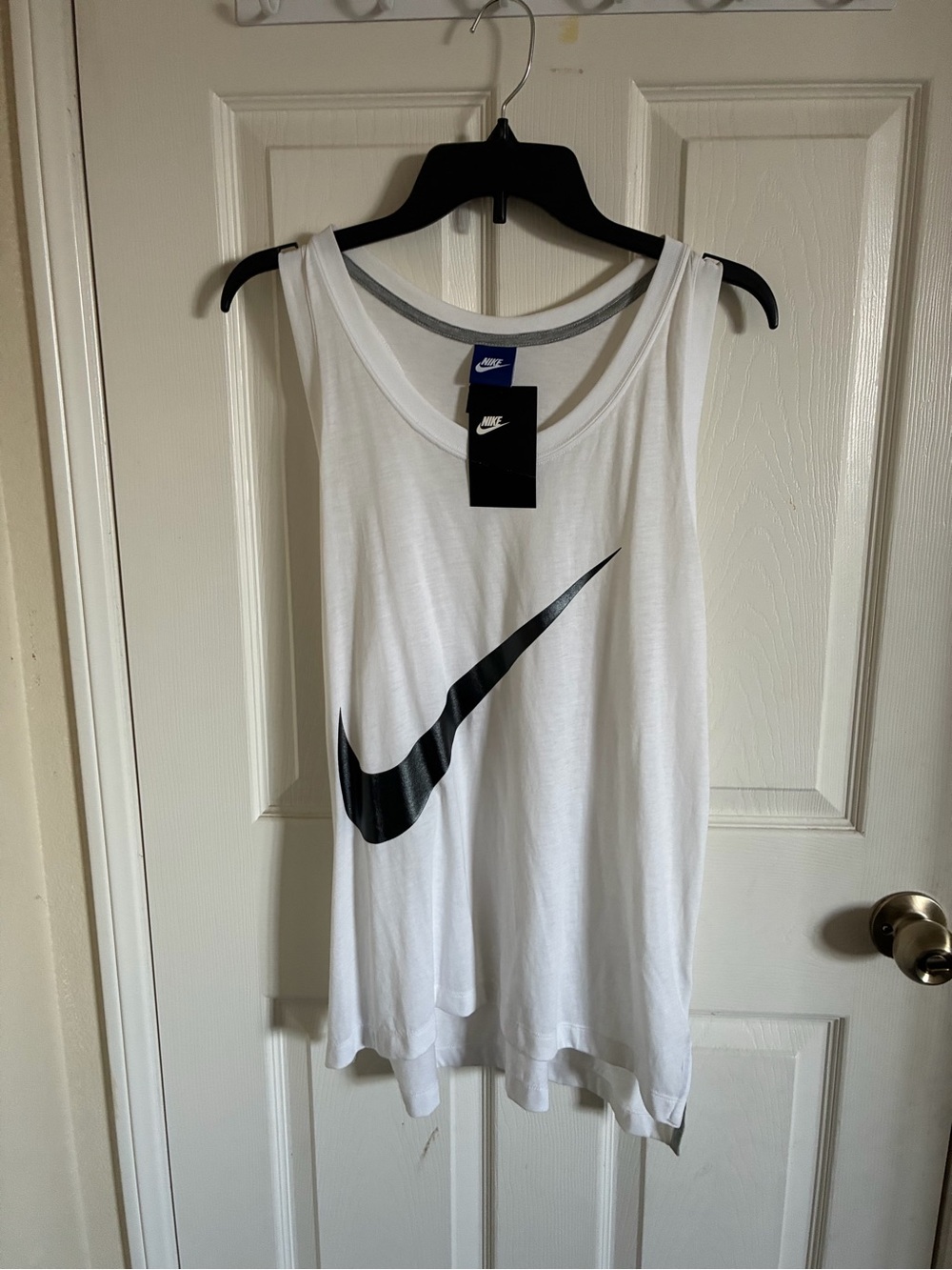 Nike White Tank Top with Black Swoosh Graphic